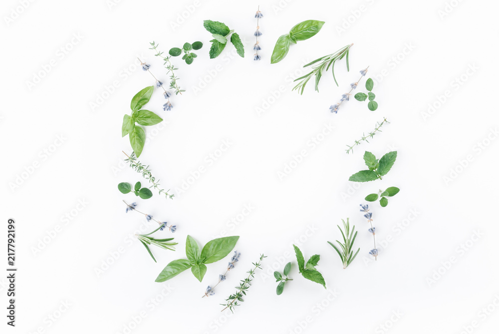 essential oils with botles and herbs on white background - obrazy, fototapety, plakaty 