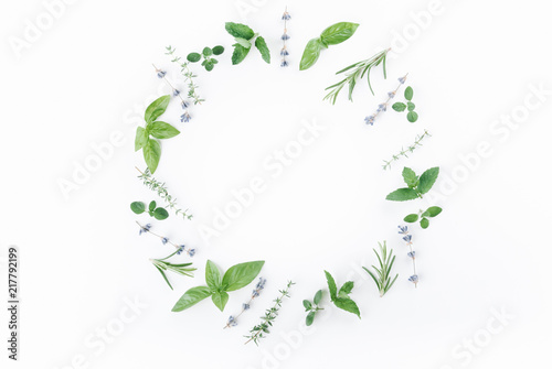 Fotomural essential oils with botles and herbs on white background