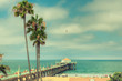 Palm trees at Manhattan Beach. Vintage processed. Fashion travel and tropical beach concept. 