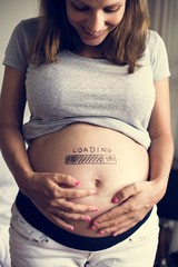 Wall Mural - A cheerful pregnant woman