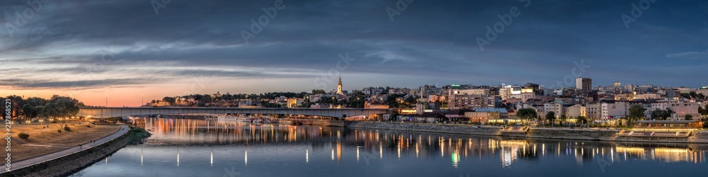Obraz na płótnie Belgrade, Old City, Cathedral, Branco's Bridge Sava River at Dusk, City Lights Water Reflections w salonie