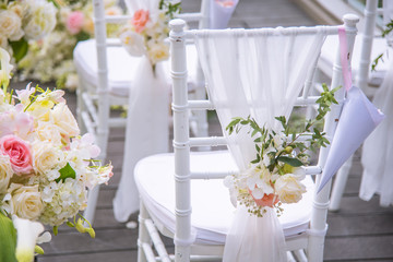 Wall Mural - Chair decorated with flowers in Wedding ceremony.