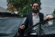 © arthurhidden - Portrait stylish, handsome man near car outdoors