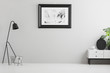 © Photographee.eu - Real photo of bright grey living room interior with simple poster, metal lamp, white cupboard and empty place for your couch