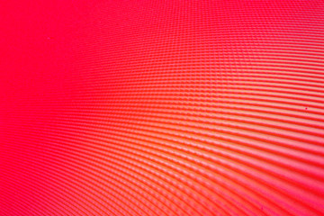 Wall Mural - an abstract bright pink background with red waves, interference, moire