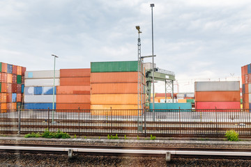 Wall Mural - Stack of Cargo Containers at the railway station