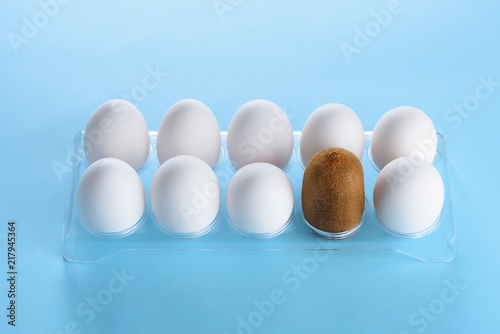 Kiwi In A Plastic Box With White Eggs Creative Idea For A Beauty