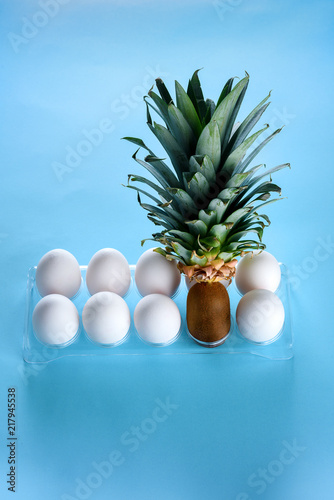 Kiwi In A Plastic Box With White Eggs Creative Idea For A Beauty