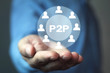  Man holding P2P word with people icon. Concept of peer to peer P2P