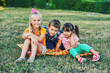 © fisher05 - Funny cute kids playing on the grass .Children friends have fun on the walk