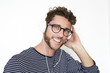 © sanneberg - Handsome guy in spectacles and headphones, portrait