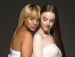 © Utkamandarinka - Women different skin color caucasian and afro models beauty ethnic beautiful girls