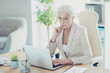 © deagreez - Grey-haired beautiful stylish old serious lady office executive