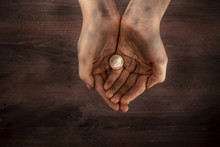 Dirty Child's Hands With One Euro Coin, Poverty Symbol, With Copy Space
