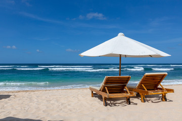 Wall Mural - Place for beach holidays with umbrellas at  Bali island,Nusa Dua beach area,Indonesia