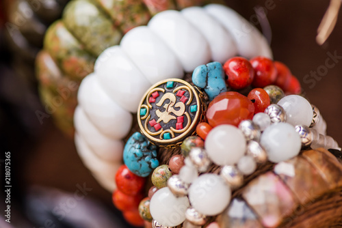 Gemstone Bracelets And Necklaces In A Row Jewelry Made Of Red Jasper Unakite And Turquoise Stones Coral Obsidian Stones And White Onyx Stone Healing Powerful Crystal Energy Esoteric Background Stock Photo