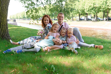 Wall Mural - happy family in city park