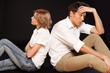 © BillionPhotos.com - Portrait of Worried Couple Sitting on the Floor Back to Back