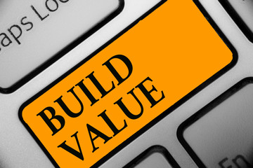 Poster - Writing note showing Build Value. Business photo showcasing efficient enough way that it will generate profit after cost Keyboard orange key Intention computer computing reflection document.