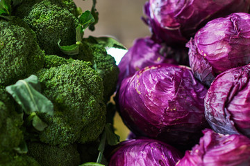 Wall Mural - Fresh vegetables for selling in the market. Cauliflower and red cabbage on the market counter. Selective focus.