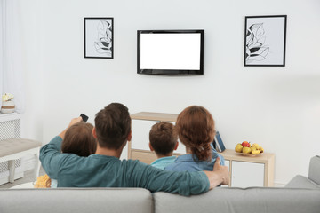 Sticker - Family watching TV in room at home