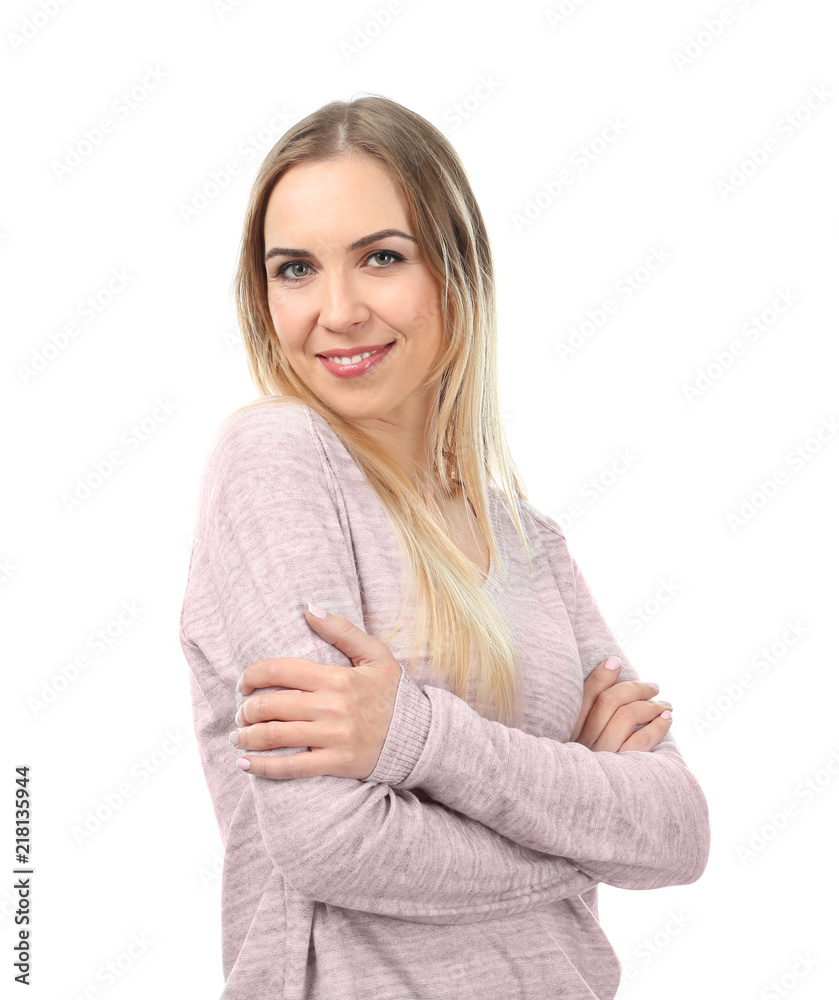Beautiful smiling woman posing against white background