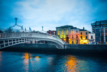Ha'Penny Bridge Over The River Liffey In Dublin Ireland Seen A Dusk