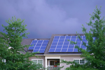 solar panel installed on the apartment roof in storm day