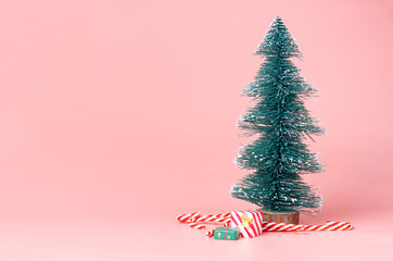 Aufkleber - Christmas tree with candy cane on pastel pink studio background.Holiday festive celebration greeting card with copy space to addng text.