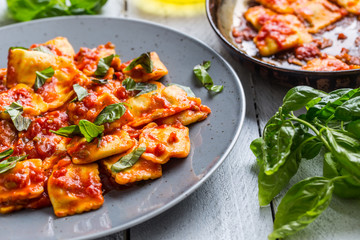 Wall Mural - Italian or mediterranean food pasta ravioli of tomato sauce.