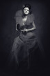 © Alex Tihonov - Woman with creative make-up in fluffy dress. Black and white