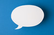© nerosu - speech bubble on blue background