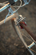 Retro bicycle on the road in sunset, detail photography of bike components