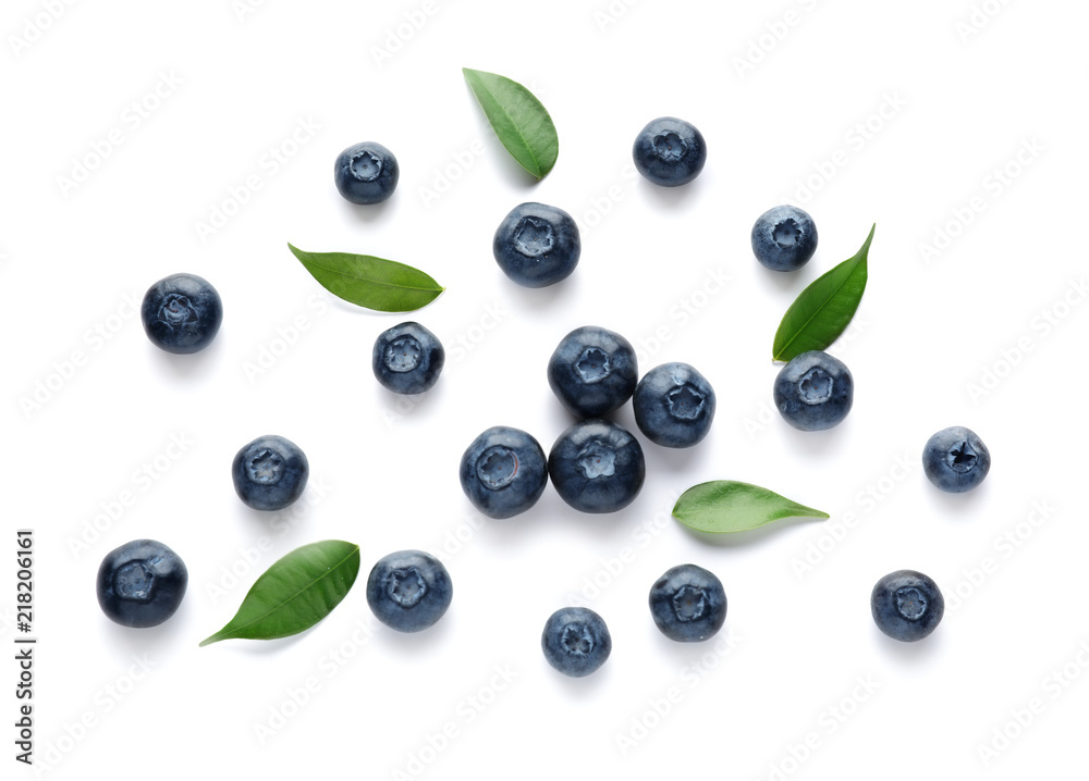 Ripe blueberries on white background