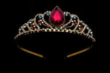 Gold Diadem With Red Ruby Stone Isolated On Black
