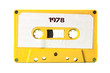 A vintage cassette tape from the 1980s era (obsolete music technology) with the text 1978 printed over it (my addition, not in the original image). Color: happy bright yellow. White background.
