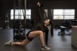 © Wavebreak Media - Woman doing stretching exercise in gym