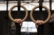 © Wavebreak Media - Woman exercising on gymnastic rings in fitness gym