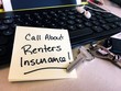 Renter Insurance concept Note on desk with handwriting to-do call about renters insurance liability and insurance claims protection concept moving day to do list
