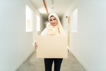 Wall Mural - asian couple moving house together with box