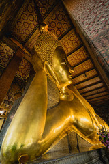 Big Buddha gold statue, Closeup golden buddha, Wat Pho at Bangkok, Thailand.