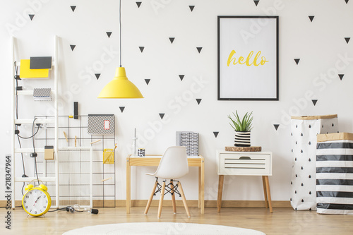 Small Wooden Desk And A Modern Chair For A Young Pupil And