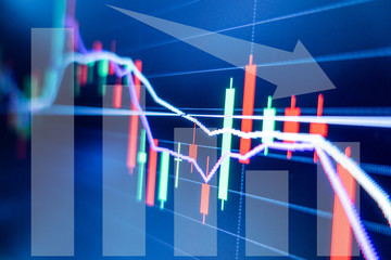 Stock market graph and candlestick chart for financial investment concept.