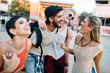© NDABCREATIVITY - Happy friends having fun at music festival