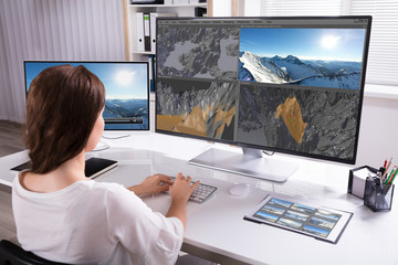 Poster - Woman Rendering 3D Landscape On Computer