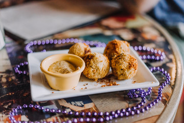 Wall Mural - Cajun appetizer, House made Boudin Balls served with creole mustard