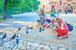 Kids and doves, Krakow, Poland