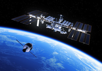 Wall Mural - crew exploration vehicle is preparing to dock with international space station