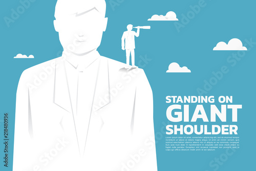 Fotografía Silhouette of businessman looking through telescope standing on giant shoulder