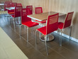 Red canteen diner chairs and tables